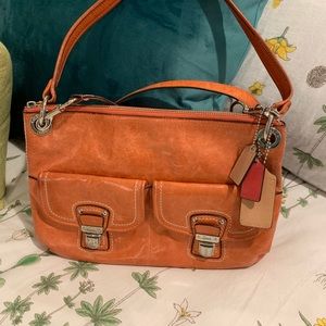 Coach messenger handbag/tangerine orange color